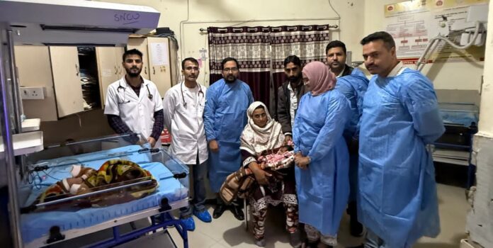 Newborn baby being cared for in GMC Doda NICU
