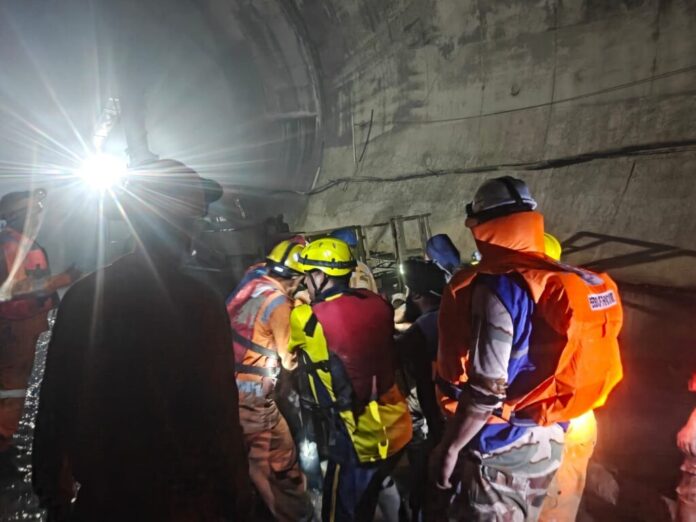 Rescue teams working at the Chamoli tunnel accident site